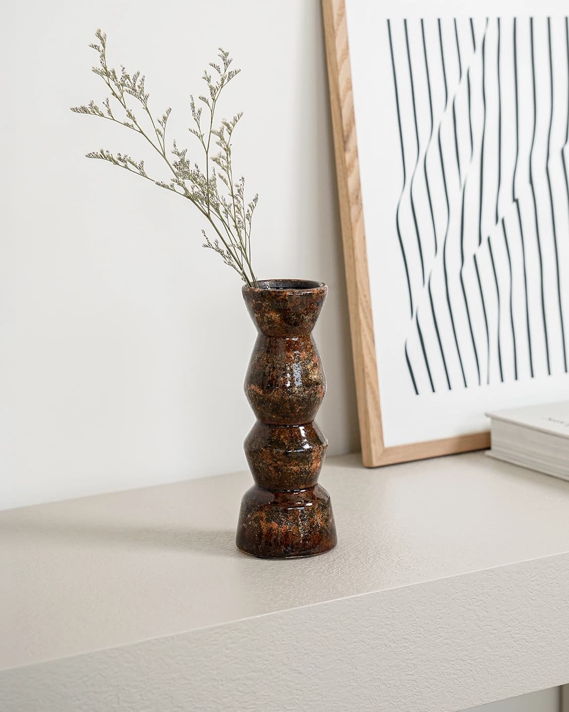 Zenith Terra II statues and sculptures in brown, shown in a lifestyle left view as image 2