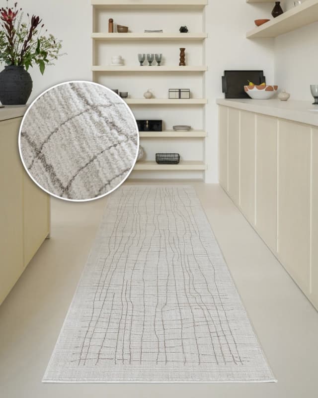 Zion Sandy Runners carpet in ivory, shown in a lifestyle front view