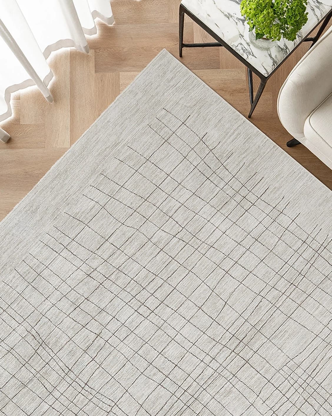 Zion Sandy carpet in sandy and ivory, shown in a lifestyle top view as image 2