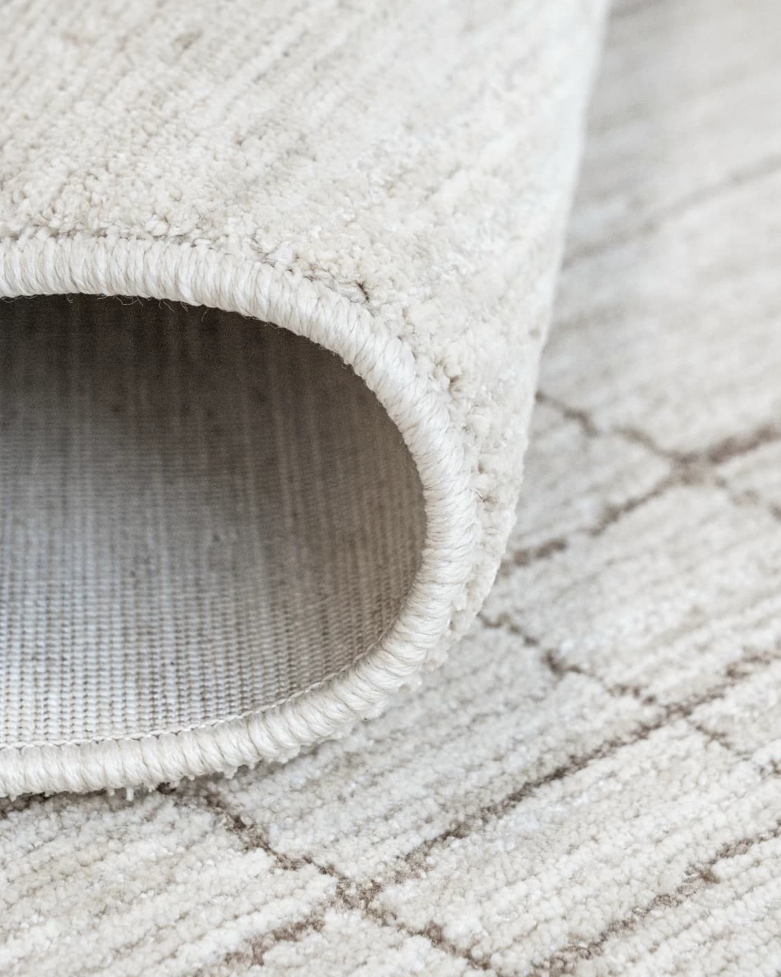Zion Sandy carpet in sandy and ivory, shown in a product close-up as image 11
