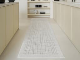 Zion Sandy Runners carpet in ivory, shown in a lifestyle front view