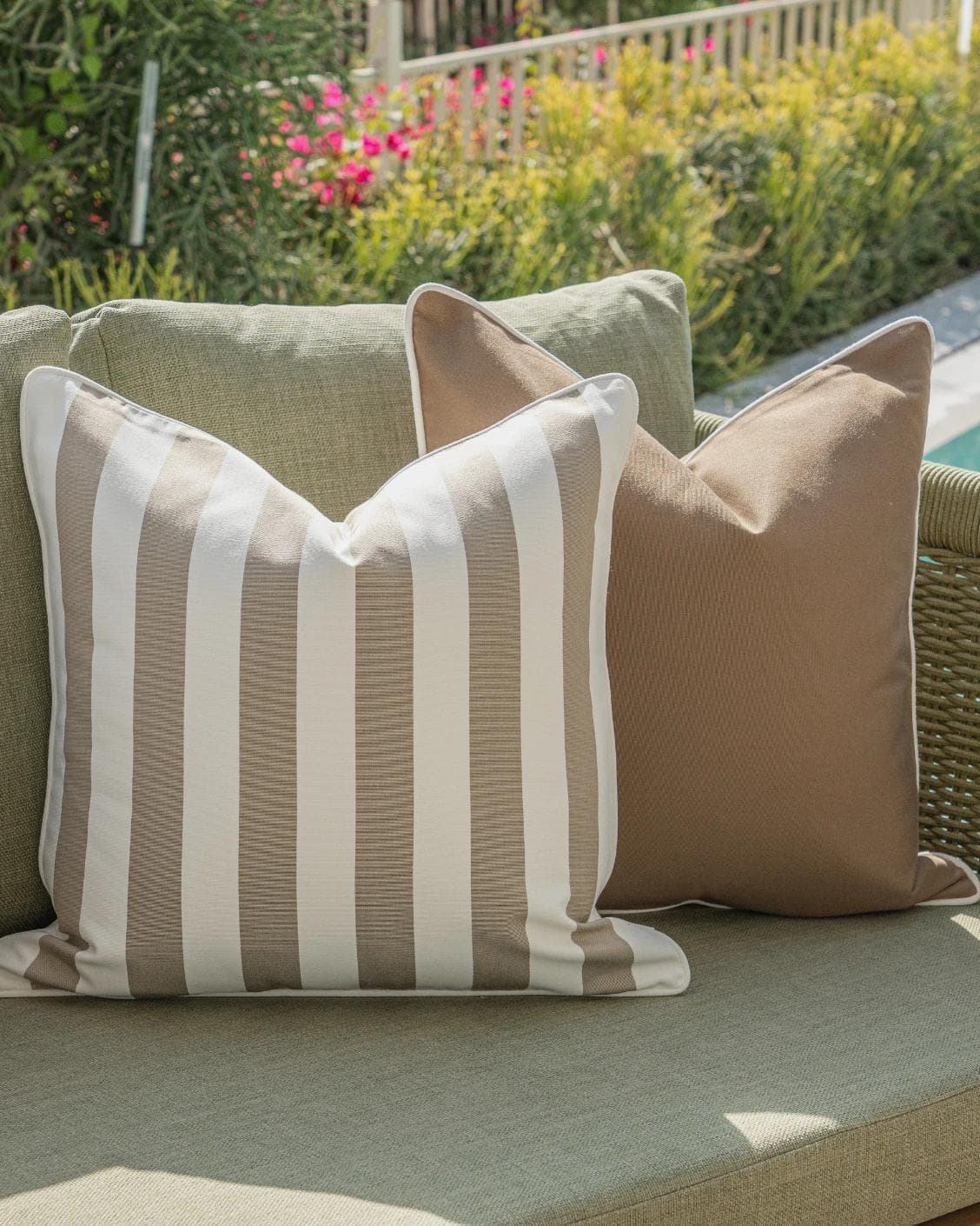 Imani Bundle cushion in brown and rust, shown in a lifestyle left view as image 5