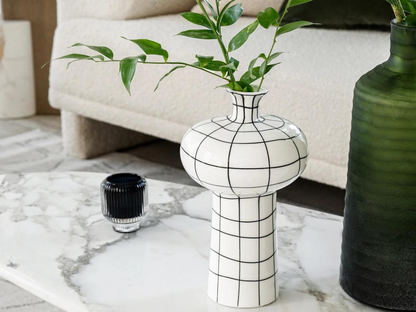 Iris Arneson vases in white and black, shown in a lifestyle right view as image 5