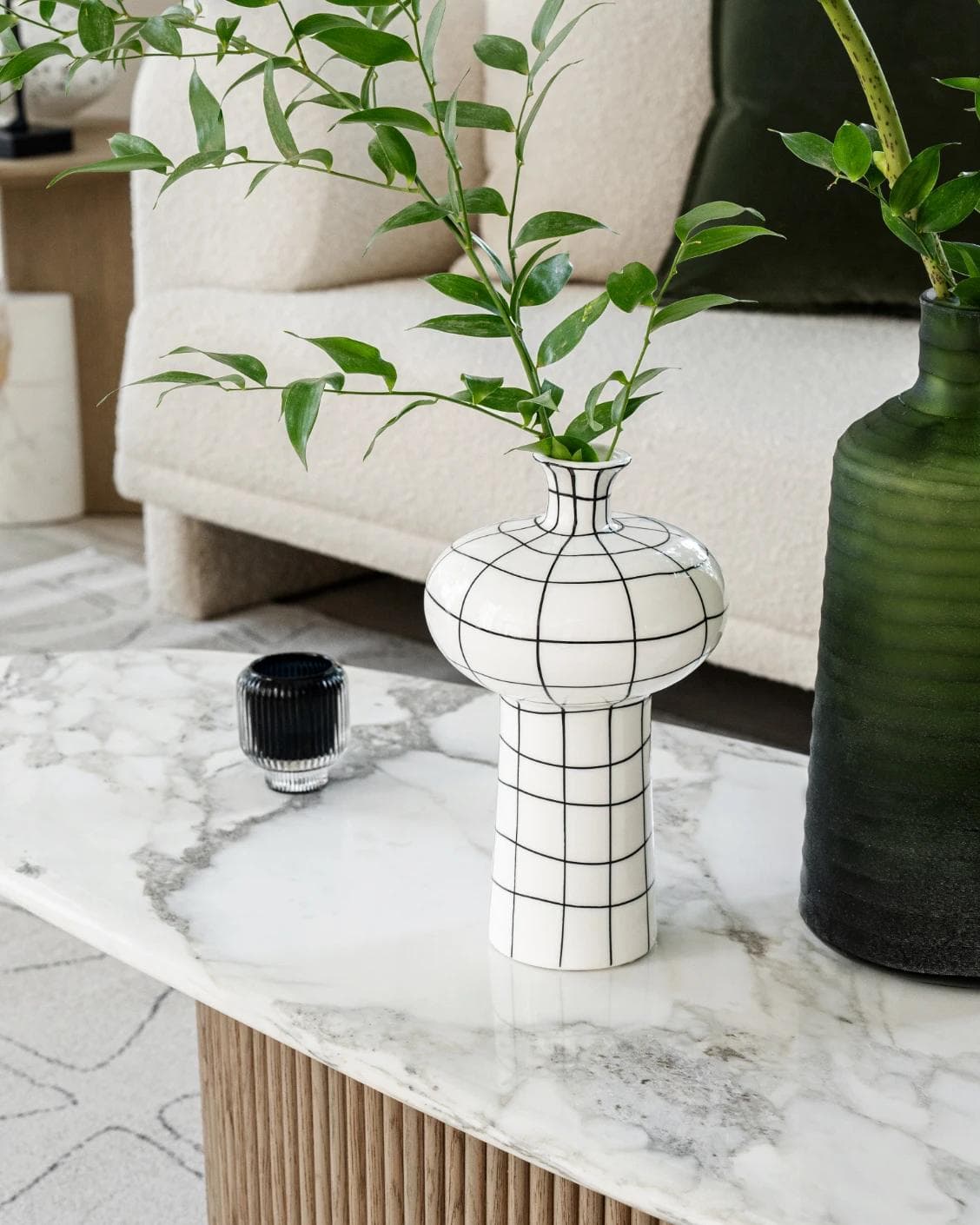 Iris Arneson vases in white and black, shown in a lifestyle right view as image 5