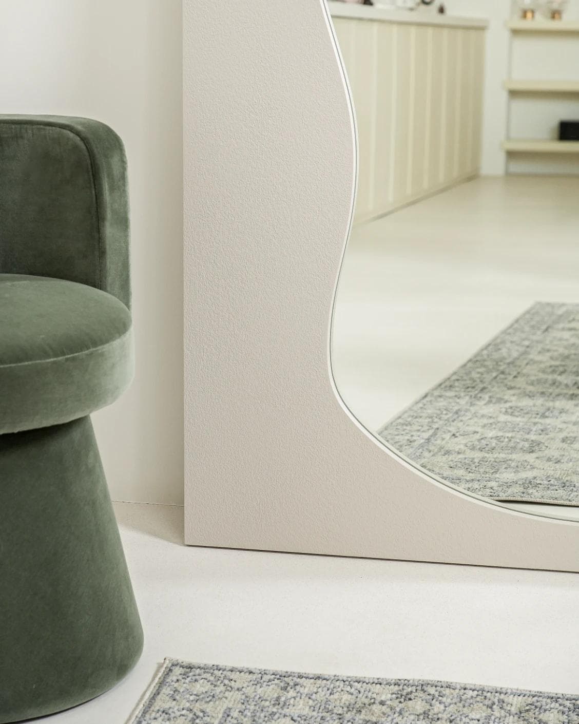 Ivrea mirror in soft ivory and stone, shown in a lifestyle close-up front view as image 4