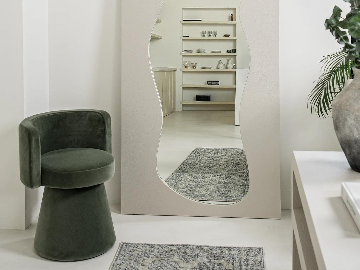 Ivrea mirror in soft ivory and stone, shown in a lifestyle front view as image 2