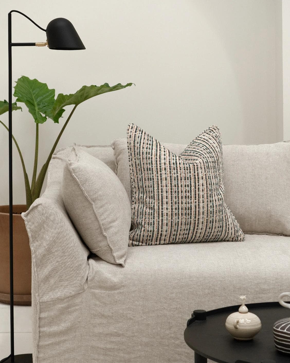 Izzy Canova cushion in ivory and multicolour, shown in a lifestyle front view as image 4