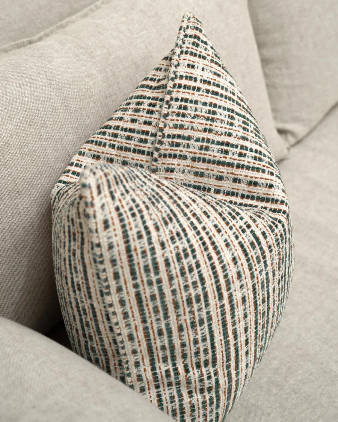 Izzy Canova cushion in ivory and multicolour, shown in a lifestyle top view as image 5