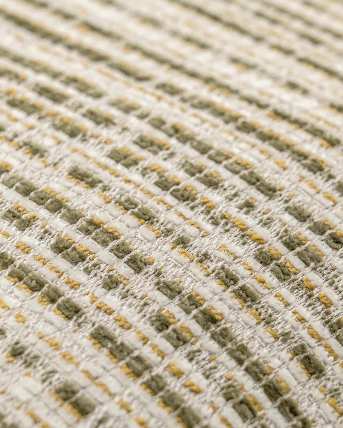 Izzy Olive cushion in ivory, shown in a product close-up as image 6