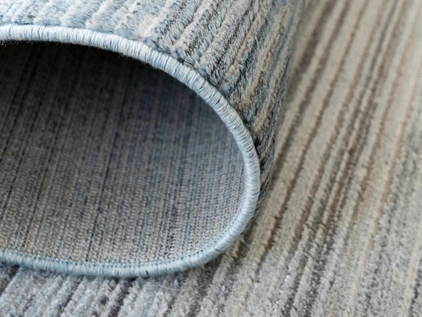 Jade Sky carpet in blue, shown in a product close-up as image 7