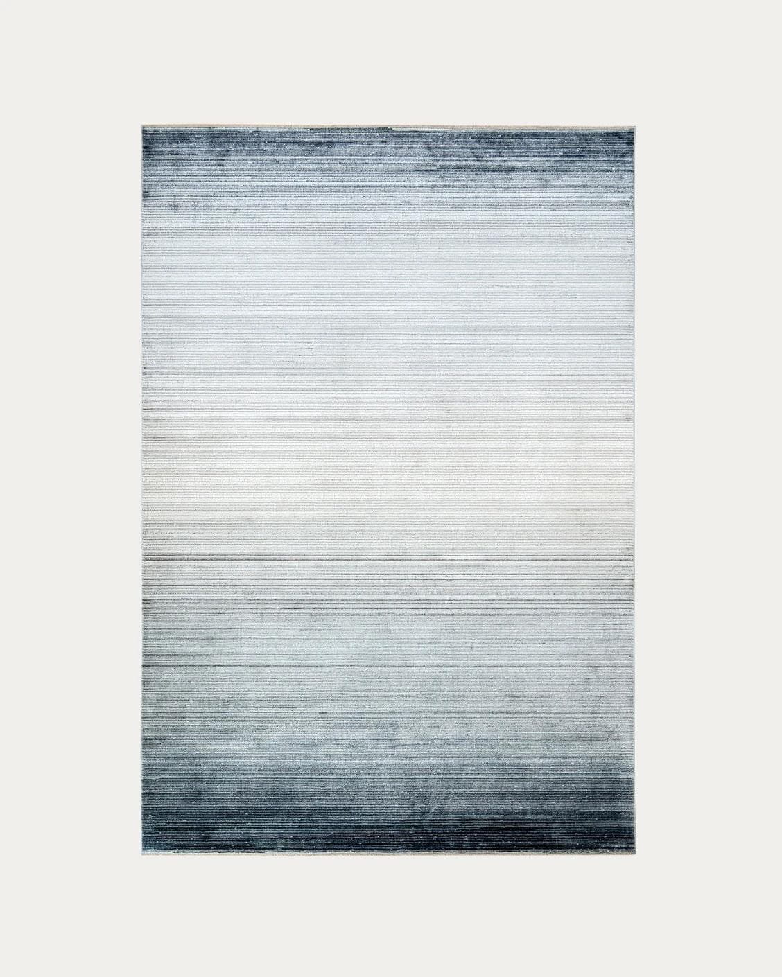 Jade Sky carpets in blue, shown in a product top view as image 1