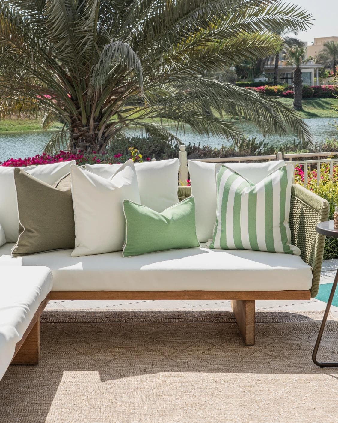 Jalena Bundle cushion in green and ivory, shown in a lifestyle front view as image 4