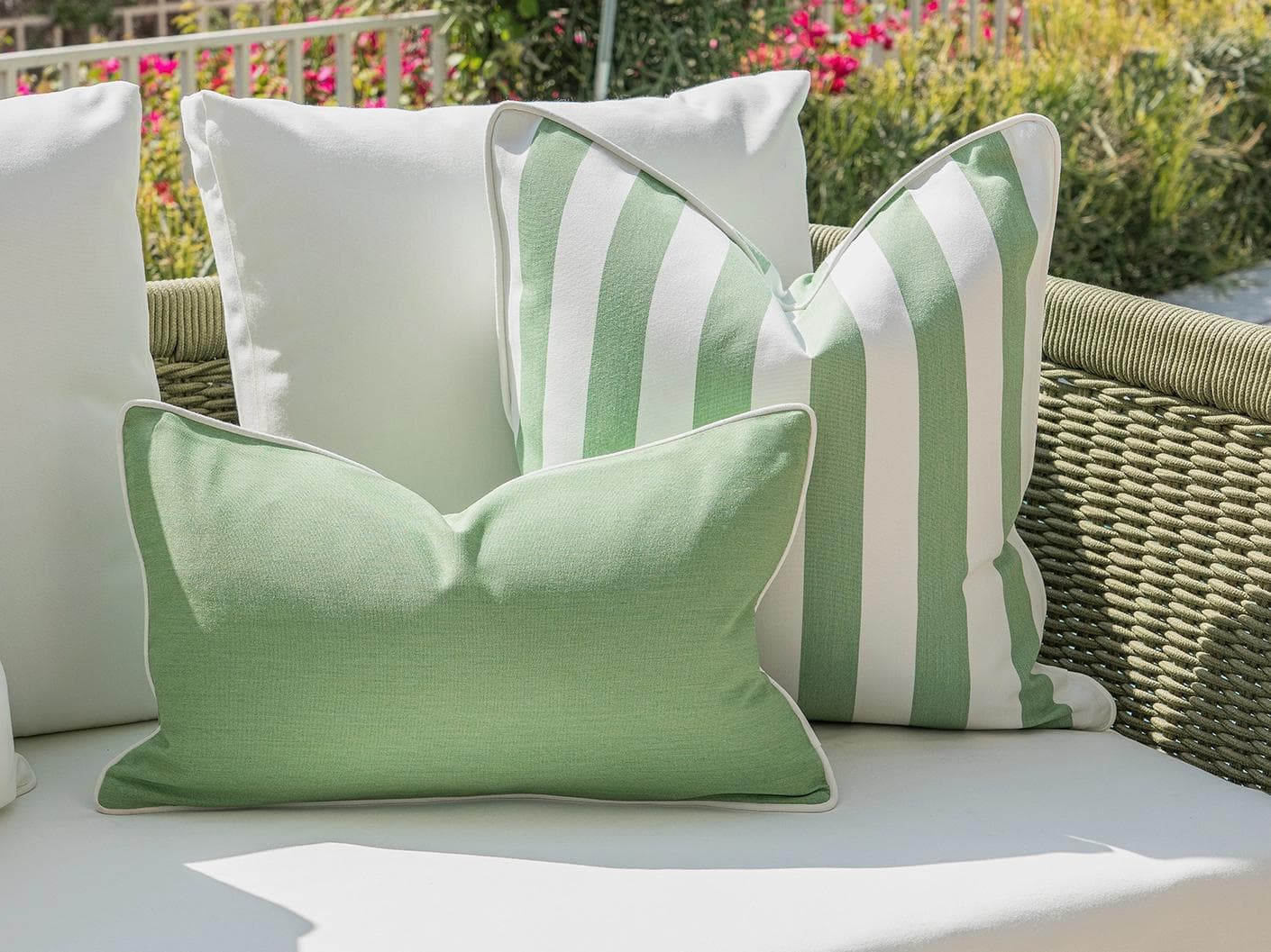 Jalena Bundle cushion in green and ivory, shown in a lifestyle left view as image 5
