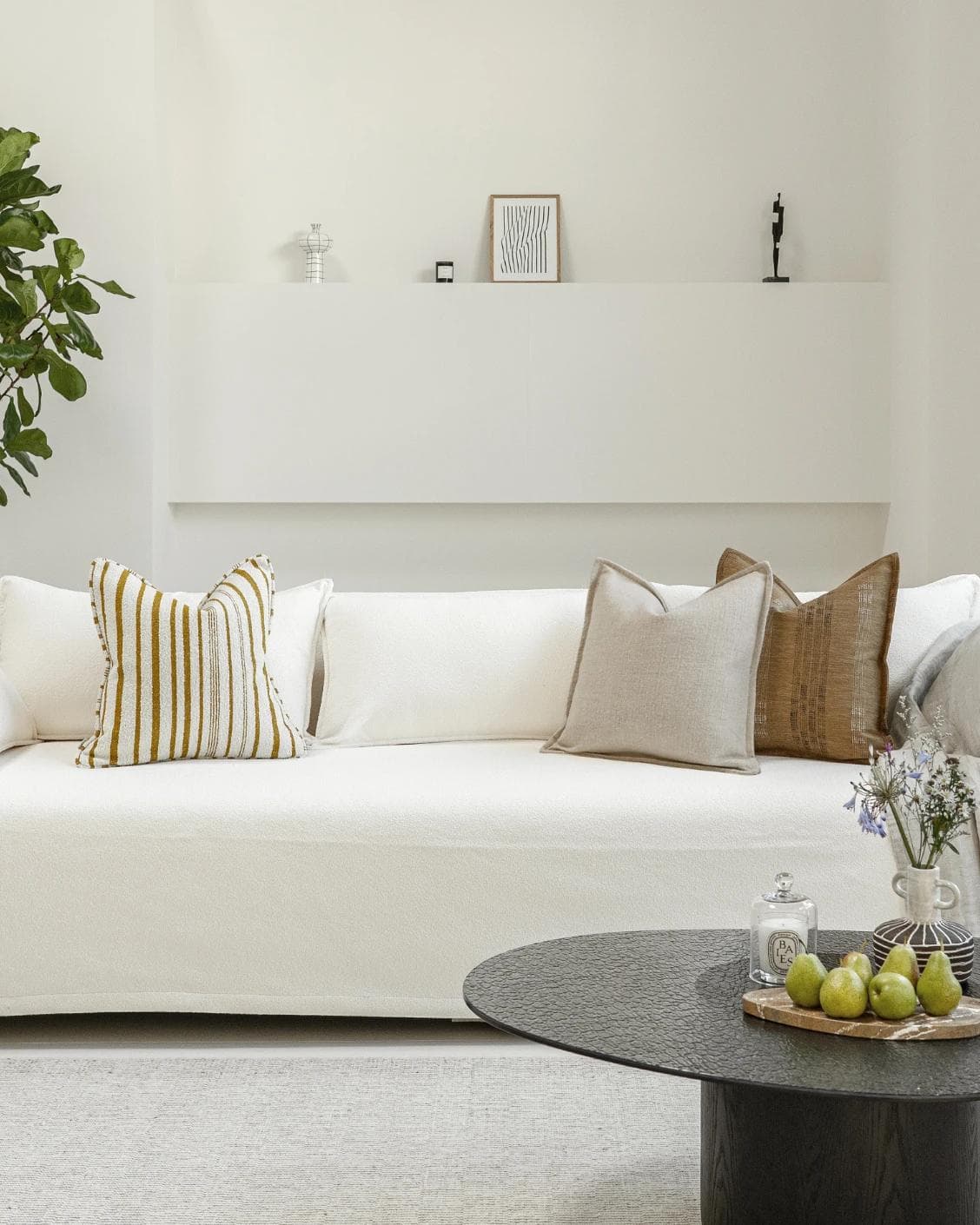 Janina Bundle cushion in beige and cream, shown in a lifestyle front view as image 4