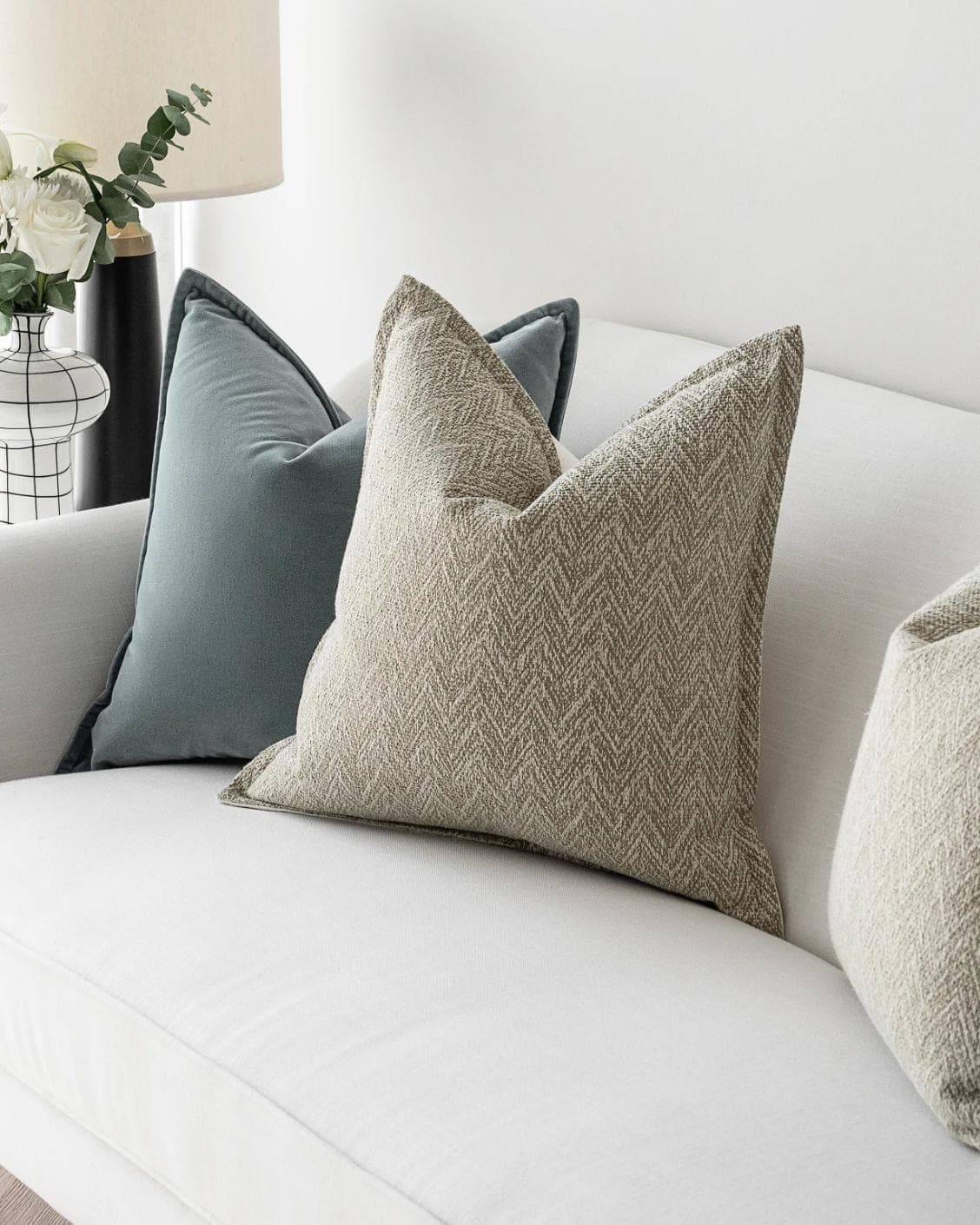 Jastine Bundle cushion in blue and beige, shown in a lifestyle right view as image 5