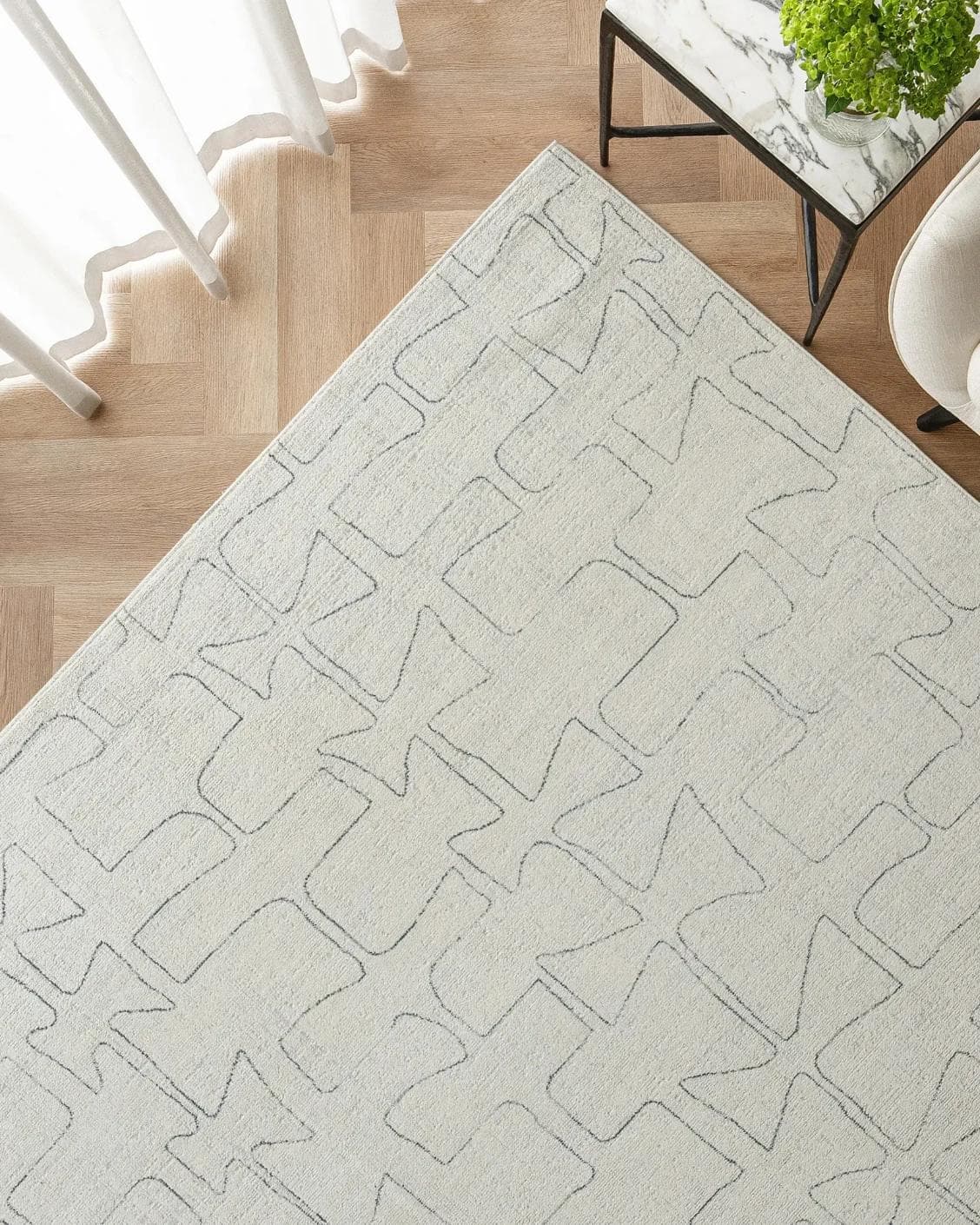 Jaxon Bianca carpet in ivory and charcoal, shown in a lifestyle top view as image 2