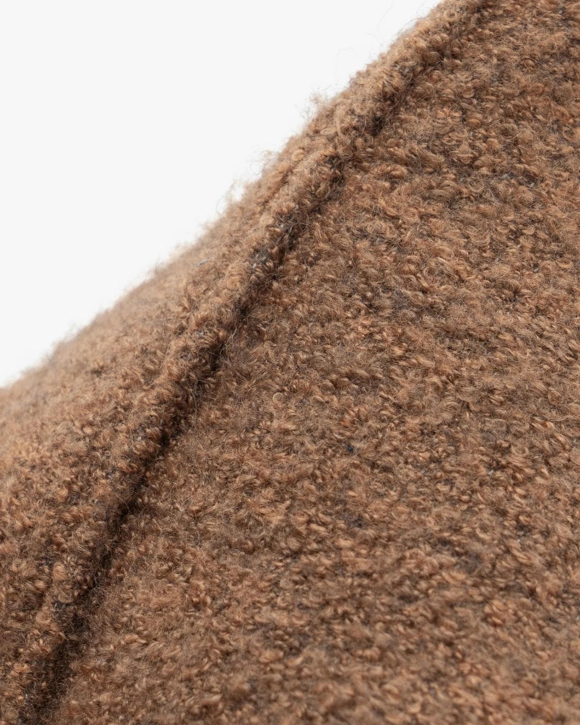 Jen Braun cushion in brown, shown in a product close-up as image 6