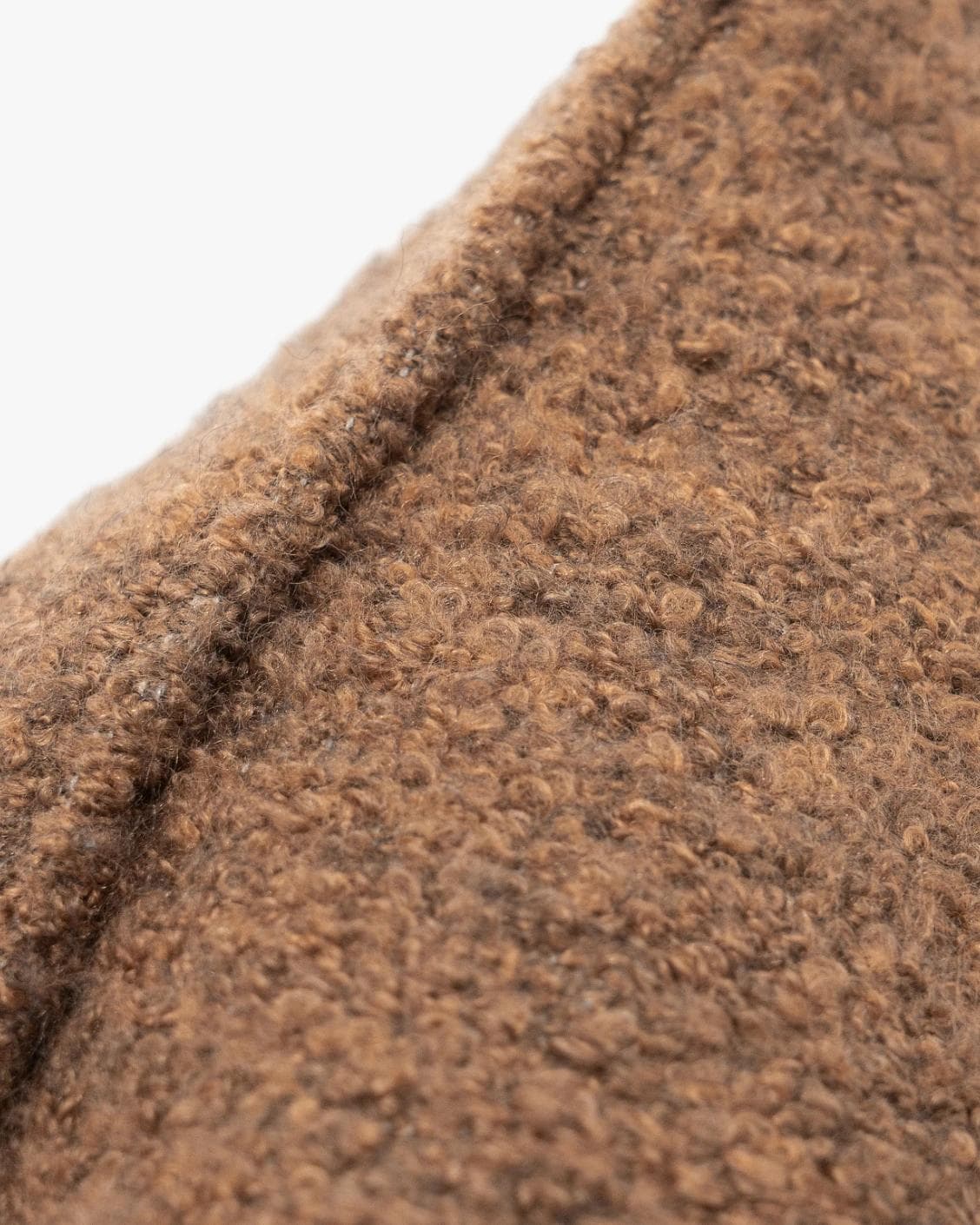 Jen Braun II cushion in brown, shown in a product close-up as image 7
