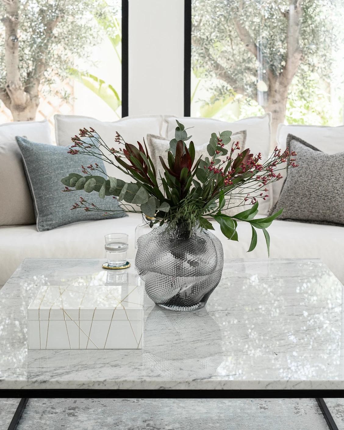 Jeremy Storms vases in grey, shown in a lifestyle front view as image 2