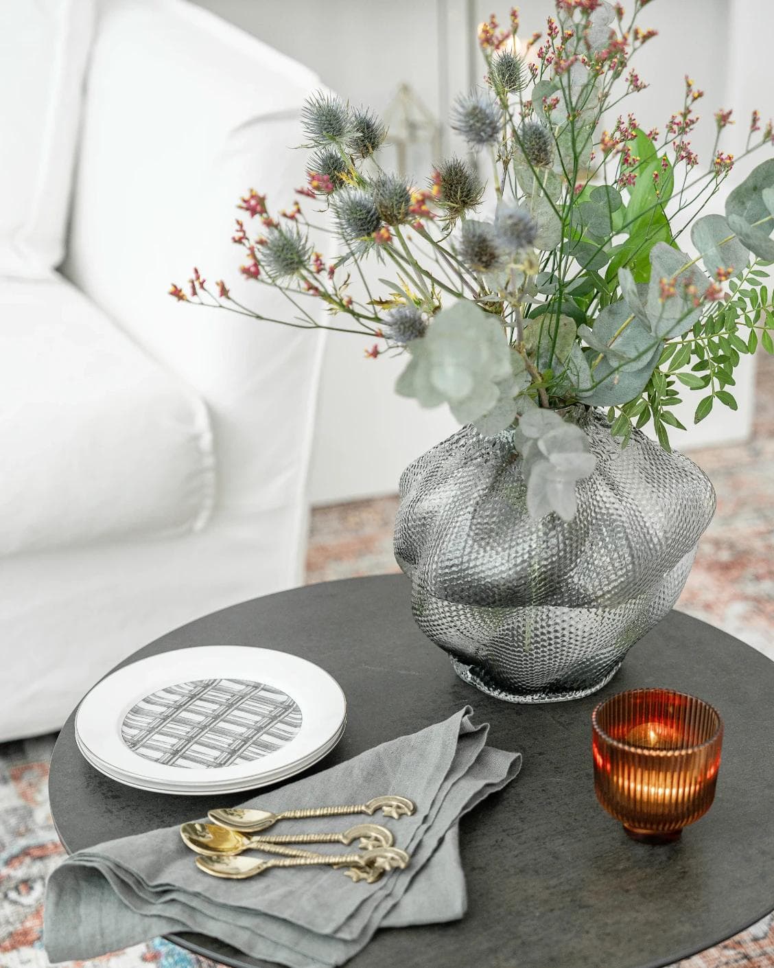 Jeremy Storms vases in grey, shown in a lifestyle left view as image 5