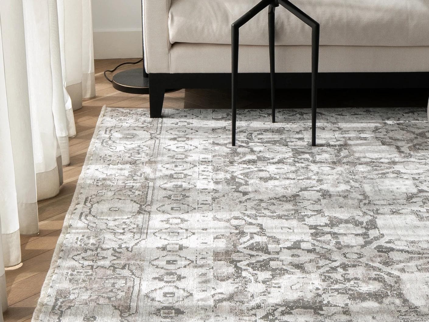 Jerik Ashton carpets in grey, shown in a lifestyle front view as image 1