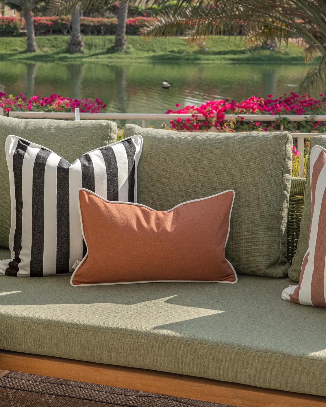 Jival Bundle cushion in black and rust, shown in a lifestyle right view as image 7
