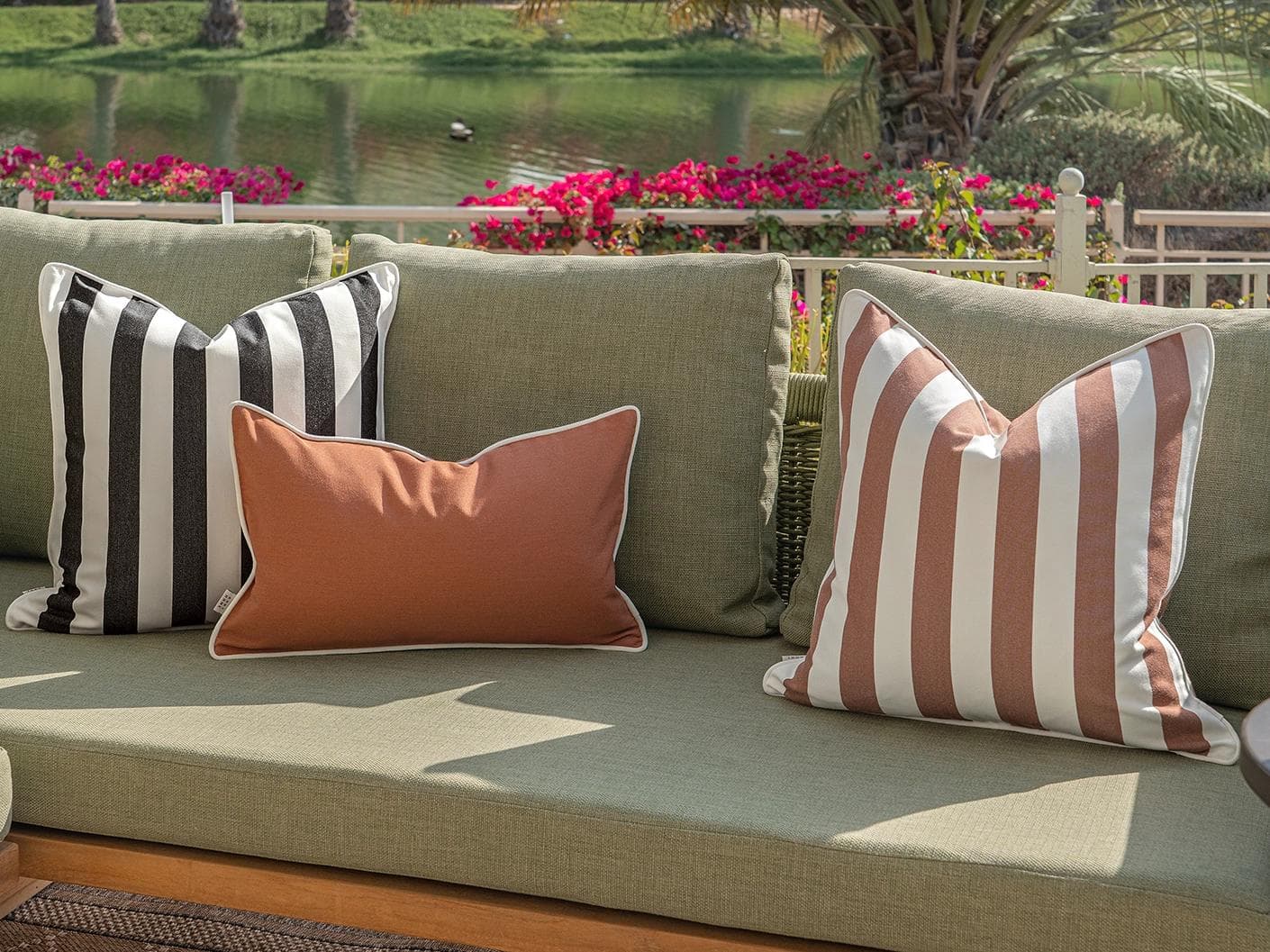 Jival Bundle cushion in black and rust, shown in a lifestyle right view as image 7