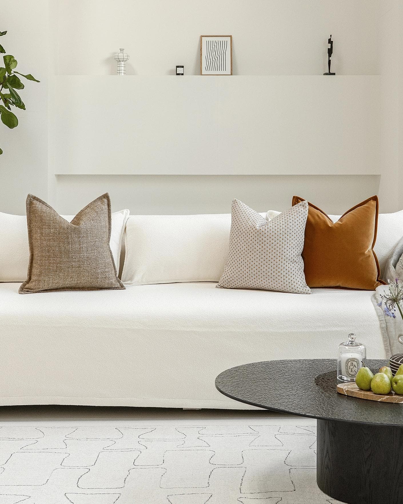 Jolvin Bundle cushion in orange and beige, shown in a lifestyle front view as image 4