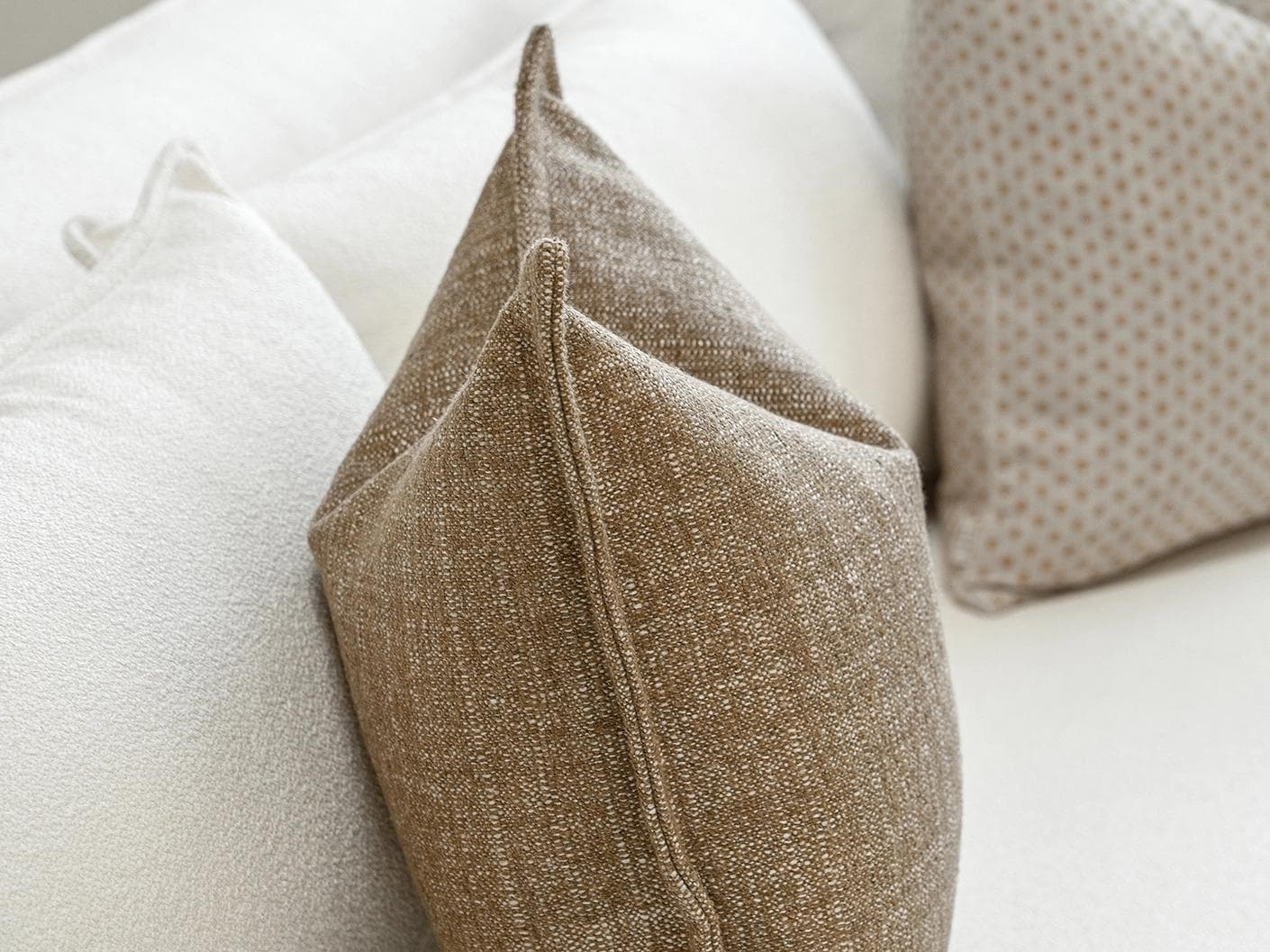 Jolvin Bundle cushion in orange and beige, shown in a product left view as image 7