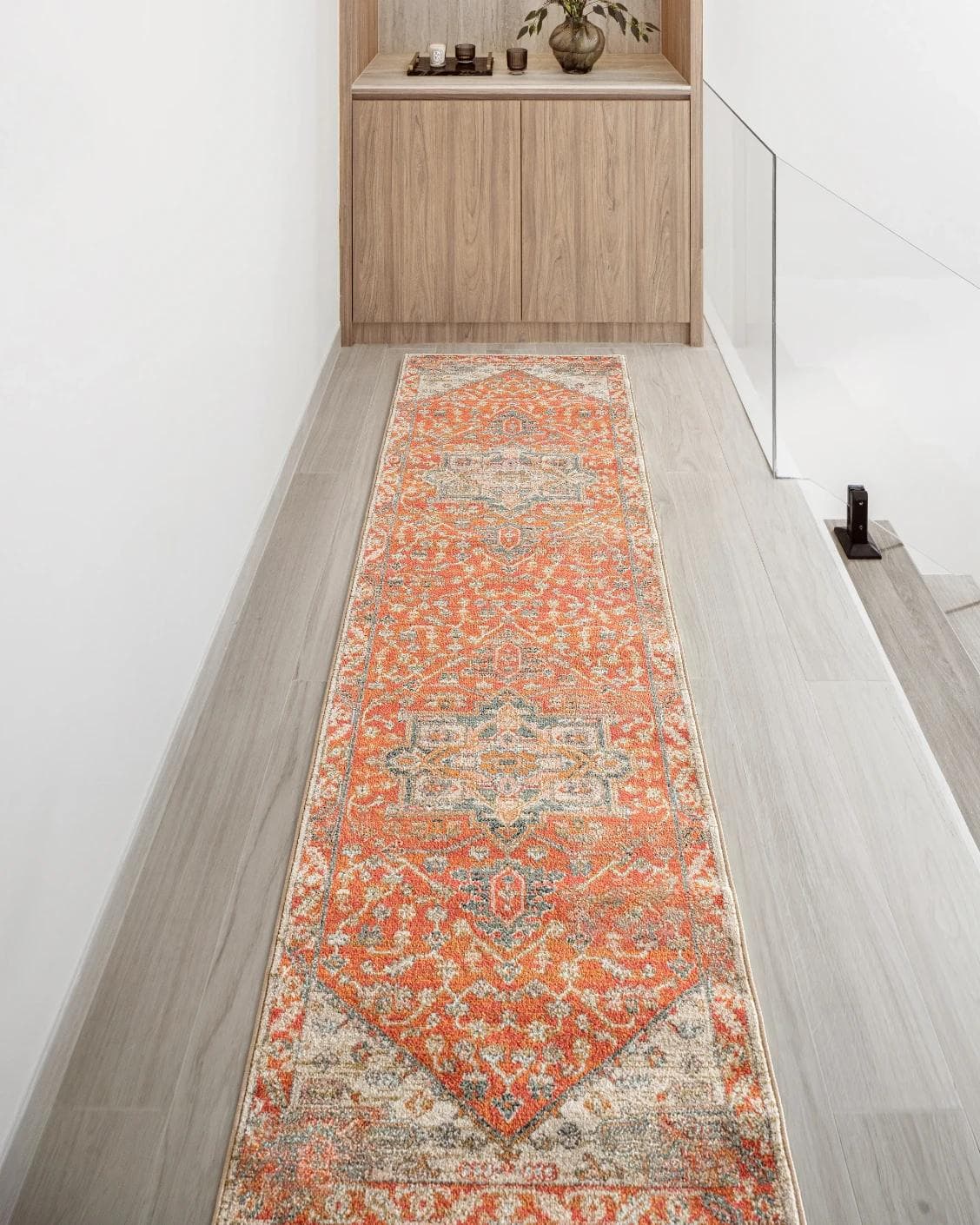 Julian Copper Runners carpet in red and beige, shown in a lifestyle front view