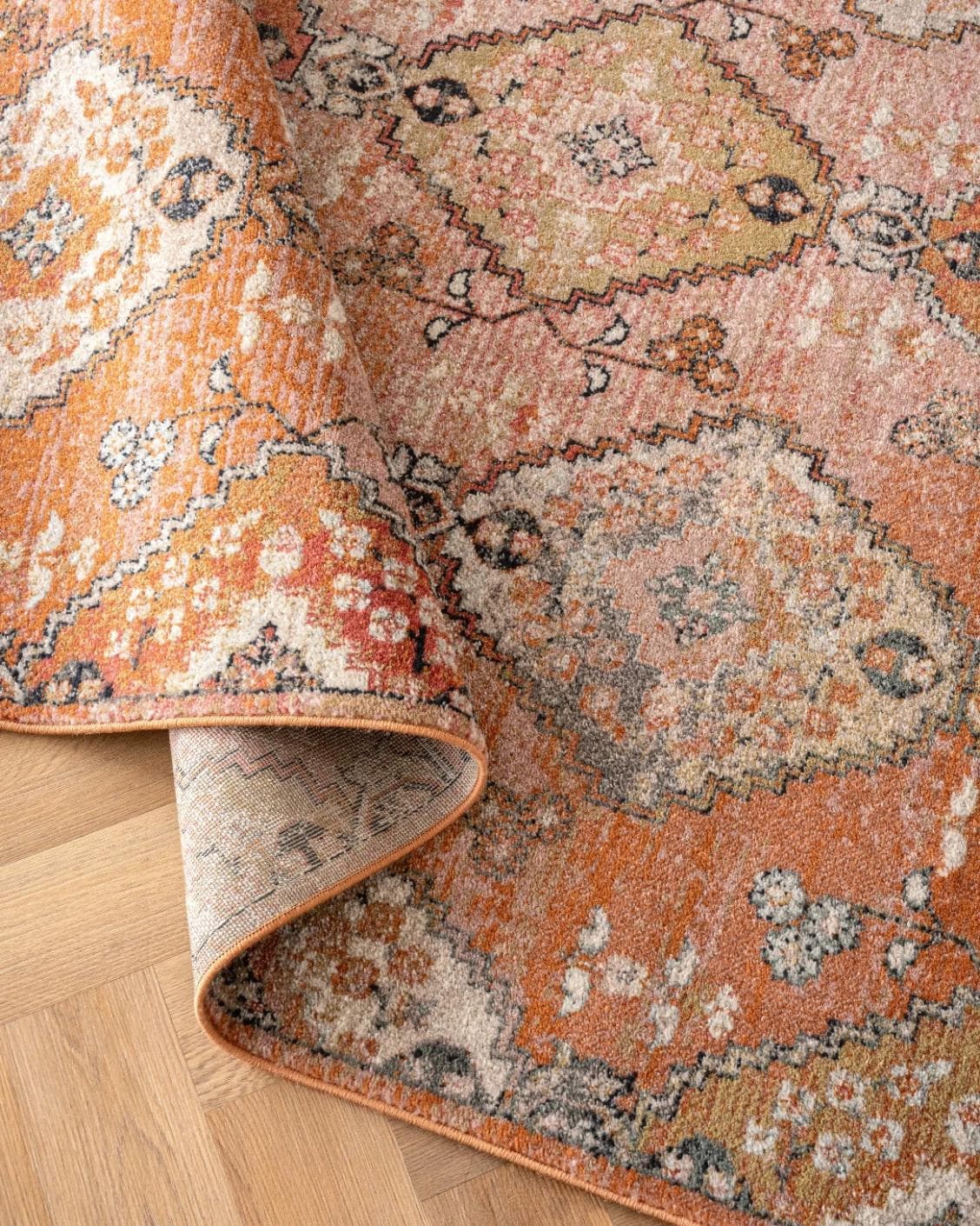 Julian Coral Runners carpet in orange and rust, shown in a product close-up as image 9