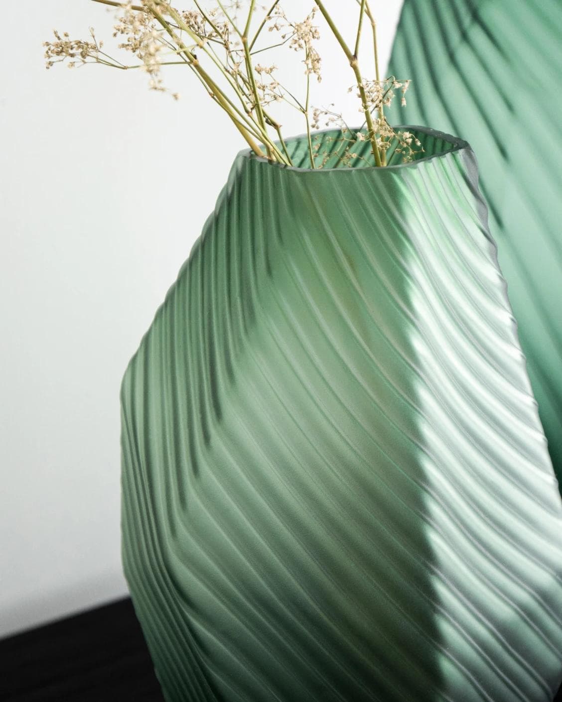Keira Bundle vases in green, shown in a lifestyle close-up as image 4