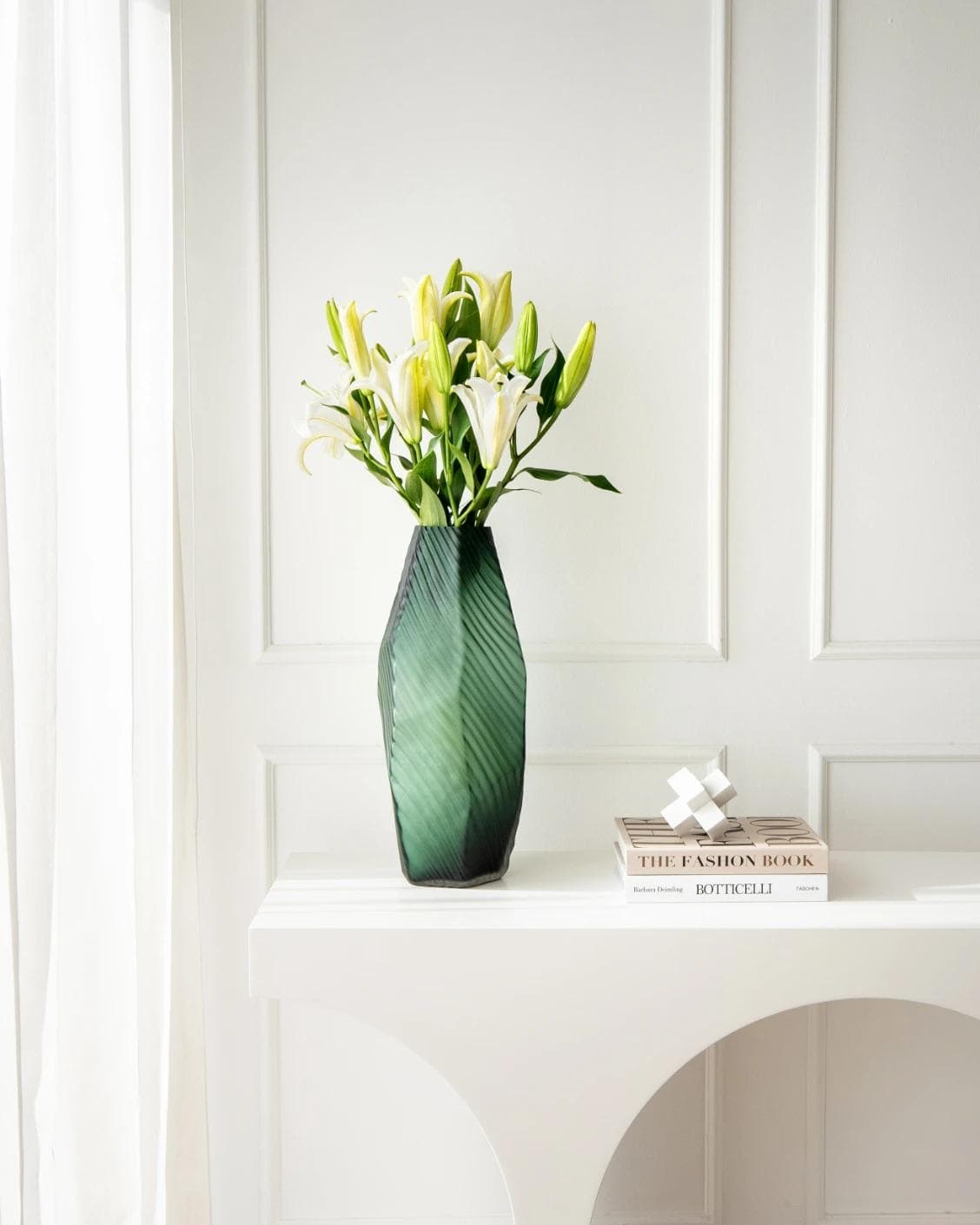 Keira Storms vases in green, shown in a lifestyle front view as image 2