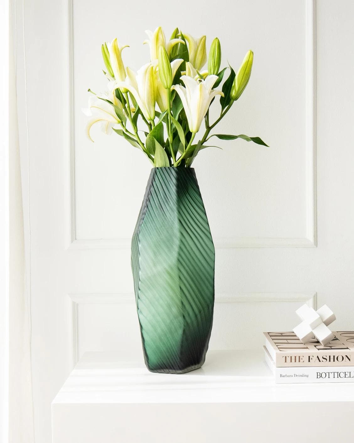 Keira Storms vases in green, shown in a lifestyle front view as image 4
