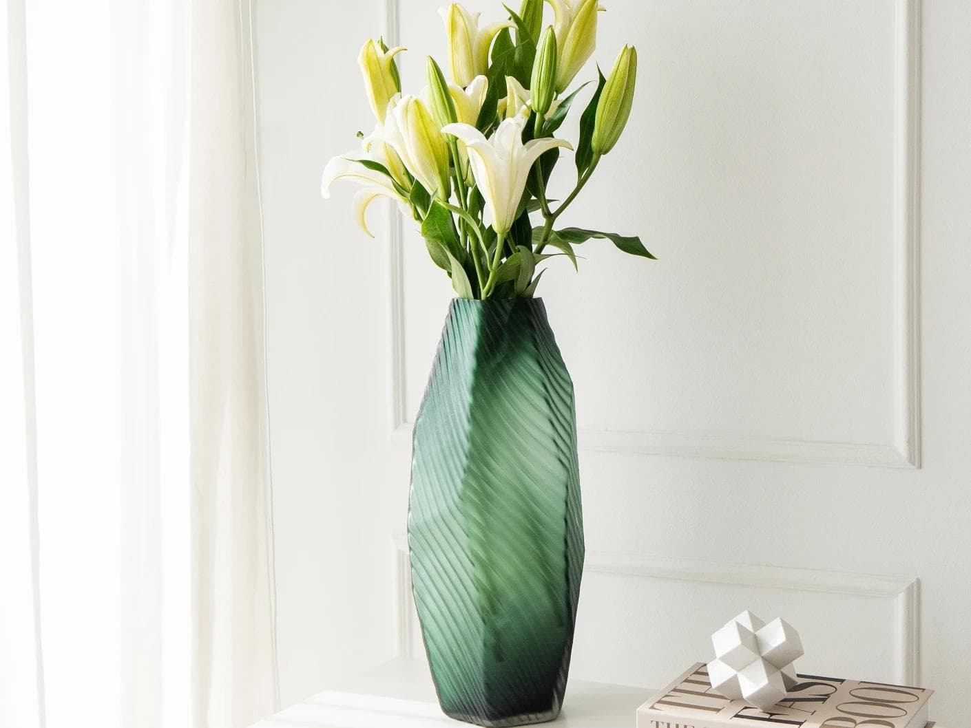 Keira Storms vases in green, shown in a lifestyle right view as image 5