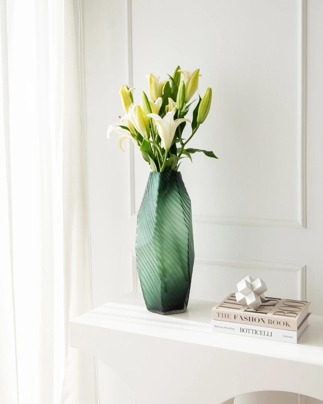 Keira Storms vases in green, shown in a lifestyle right view as image 5