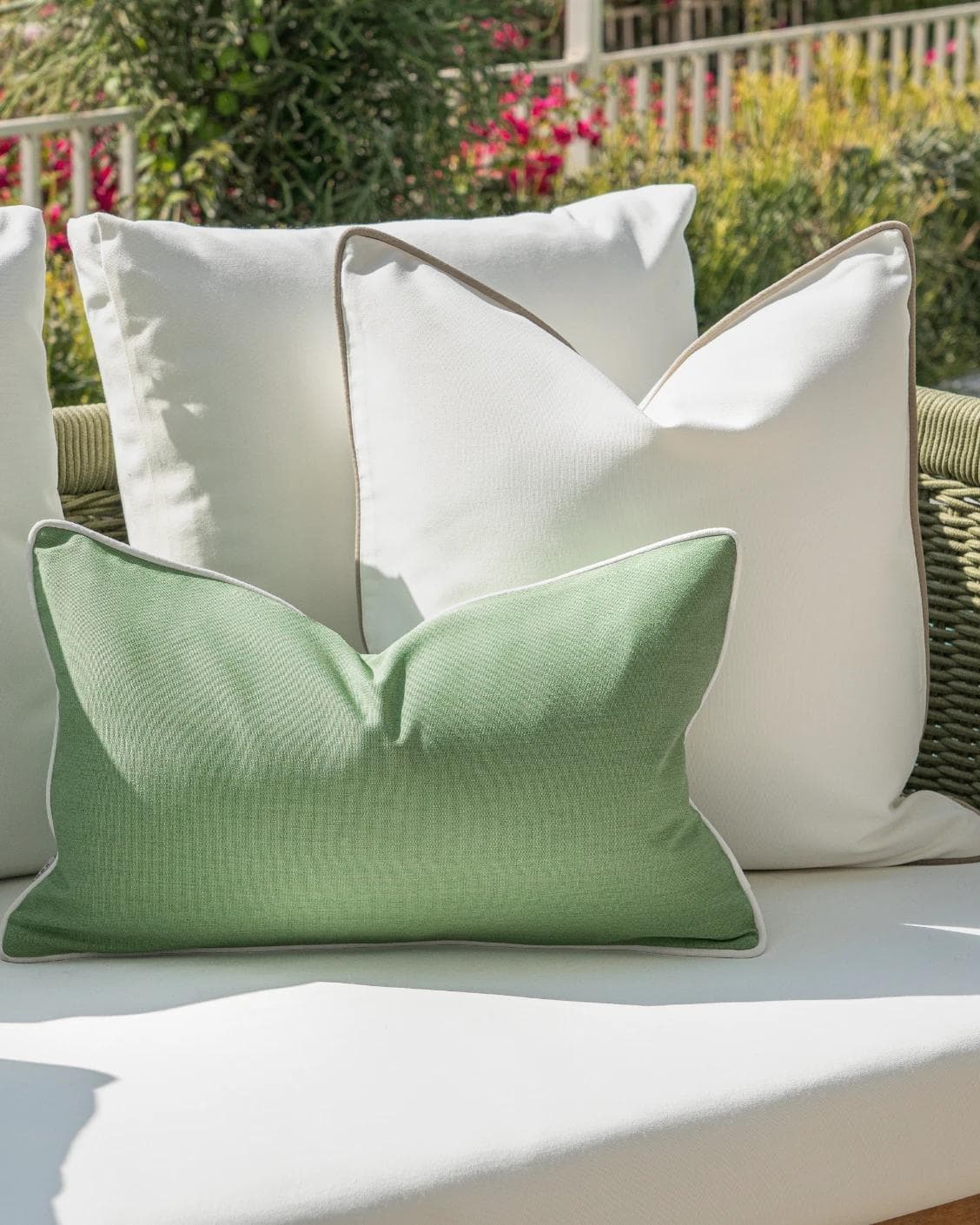 Keyla Bundle cushion in green and ivory, shown in a lifestyle left view as image 6