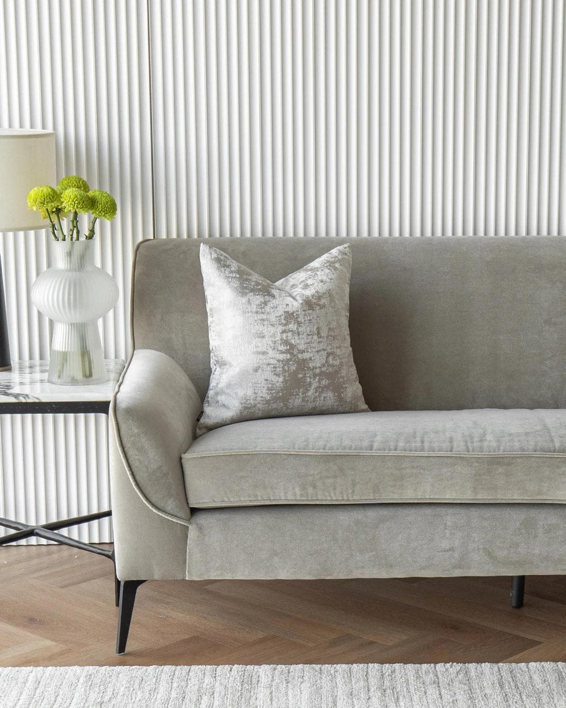 Kylie Hodler cushion in silver and grey, shown in a lifestyle front view as image 4
