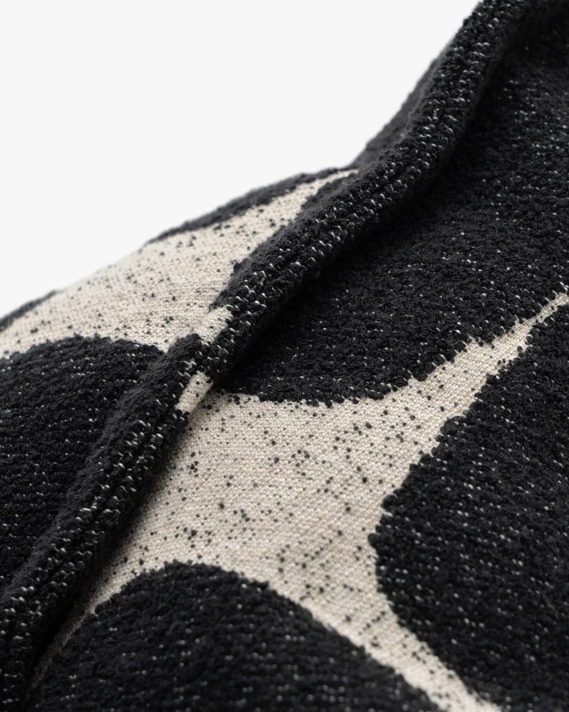Kyomi Steele cushion in charcoal, shown in a product close-up as image 7