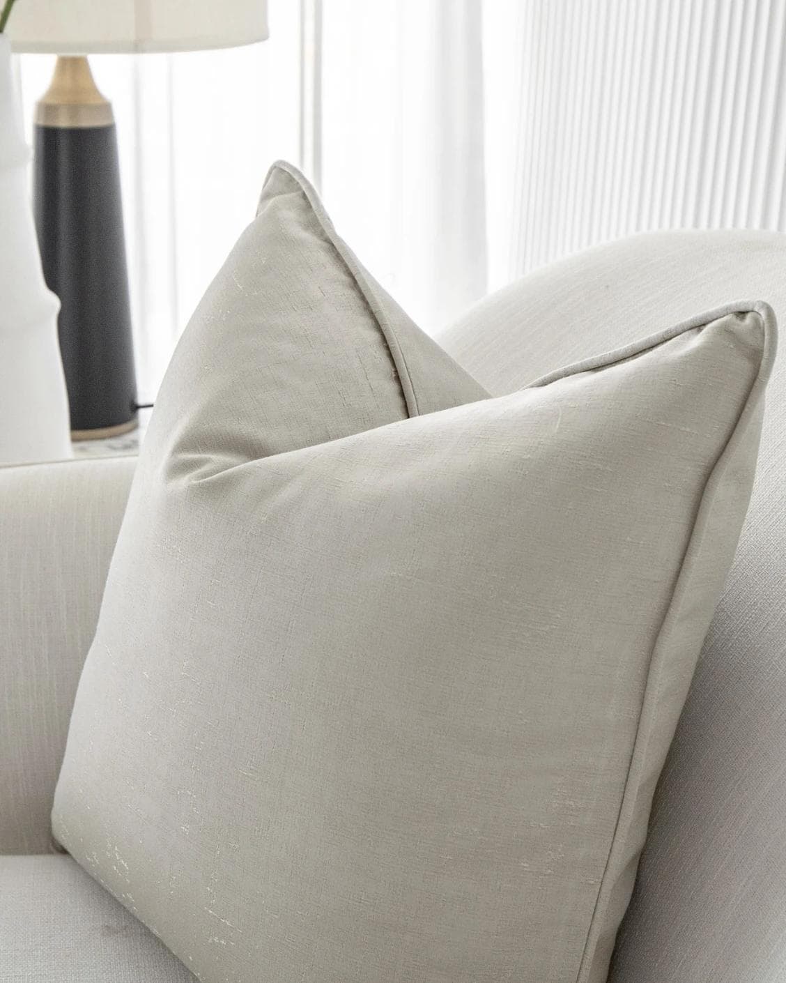 Lainie Laurent cushion in silver, shown in a lifestyle right view as image 5