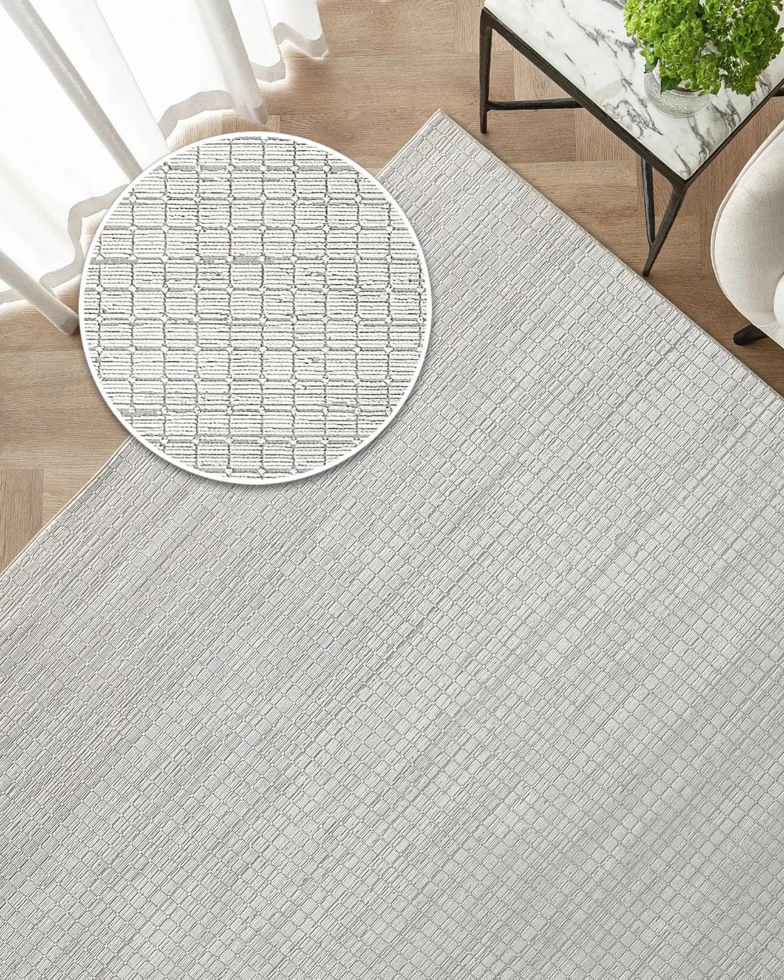 Laino Alba carpet in ivory and grey, shown in a lifestyle top view as image 2
