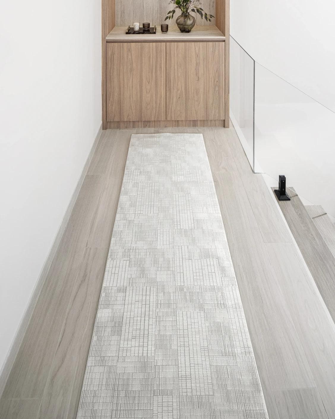 Laino Ashton Runners carpet in ivory and grey, shown in a lifestyle front view
