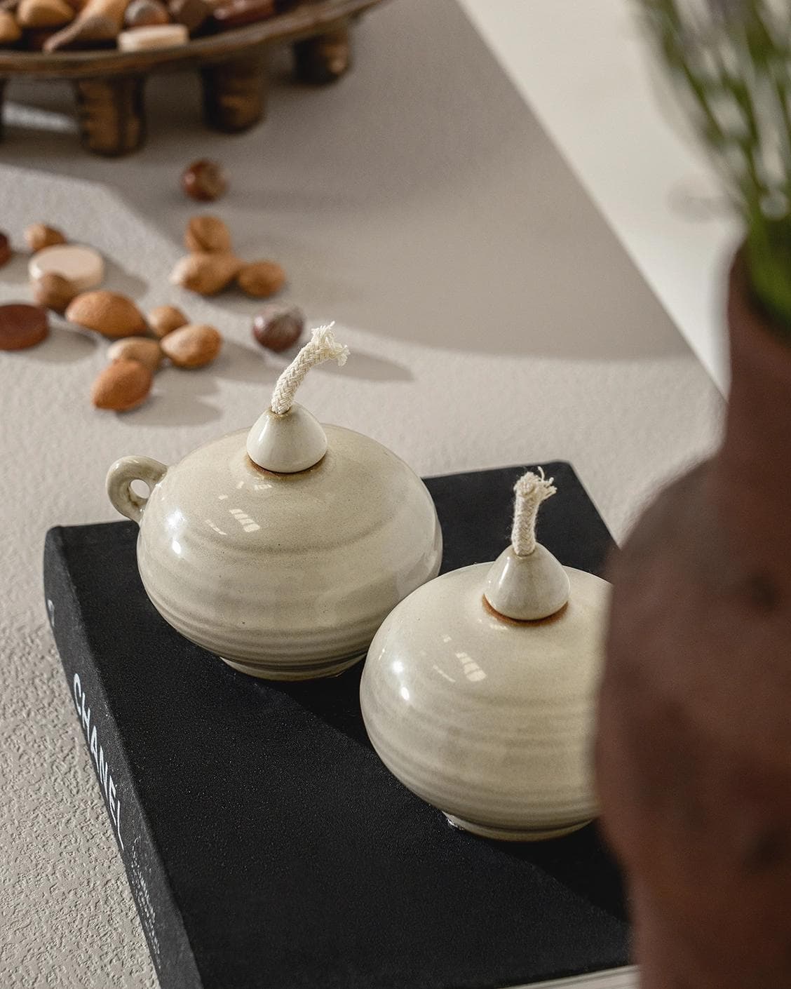 Layal Terra Bundle candle holders in soft ivory and ivory, shown in a lifestyle top view as image 6