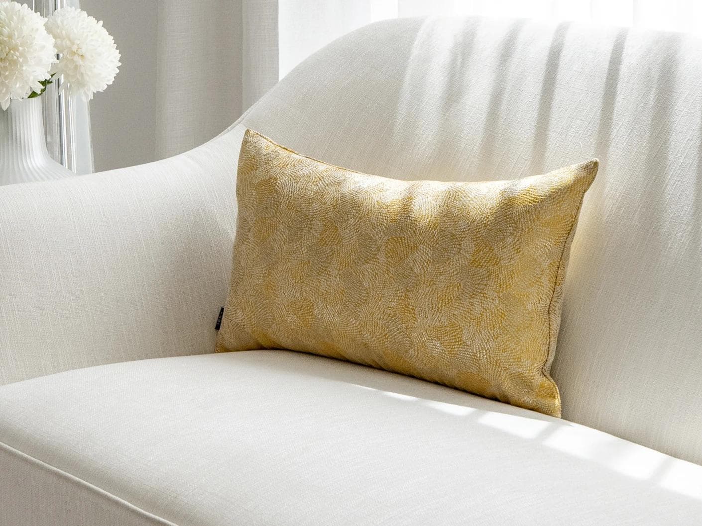 Leah Klimt cushion in yellow, shown in a lifestyle front view as image 2