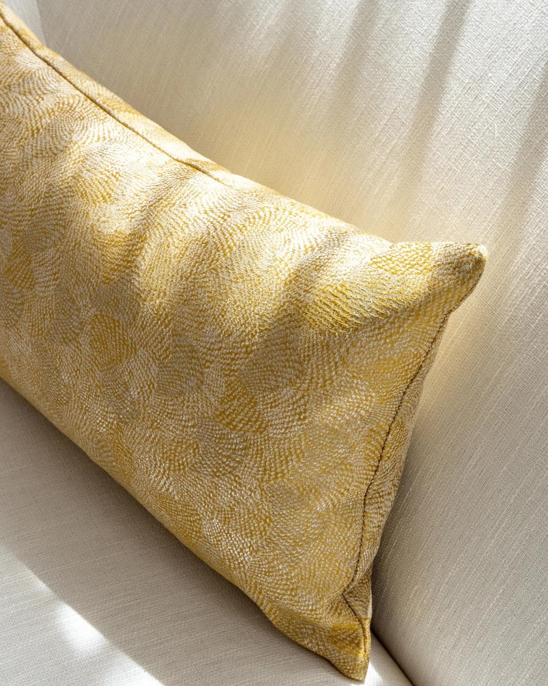 Leah Klimt cushion in yellow, shown in a lifestyle top view as image 5