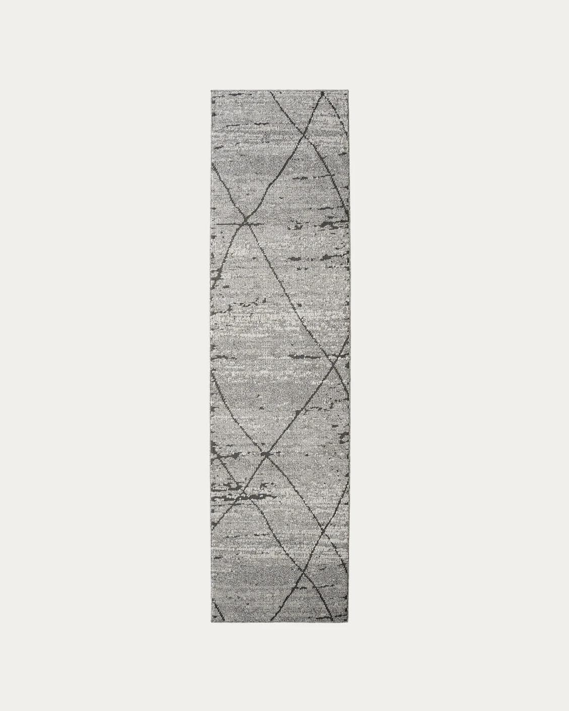 Leila Ashton carpets in charcoal, shown in a product top view as image 1