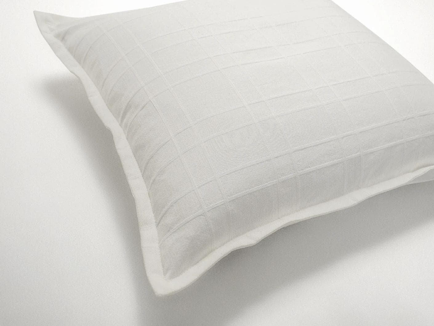 Lenora Bianca cushion in white, shown in a product as image 6