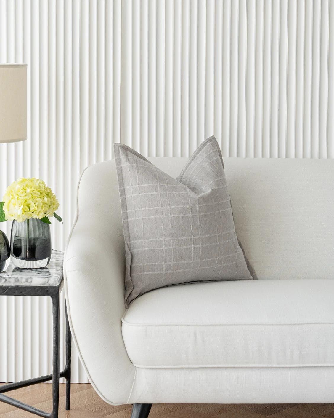 Lenora Laurent cushion in grey, shown in a lifestyle front view as image 4