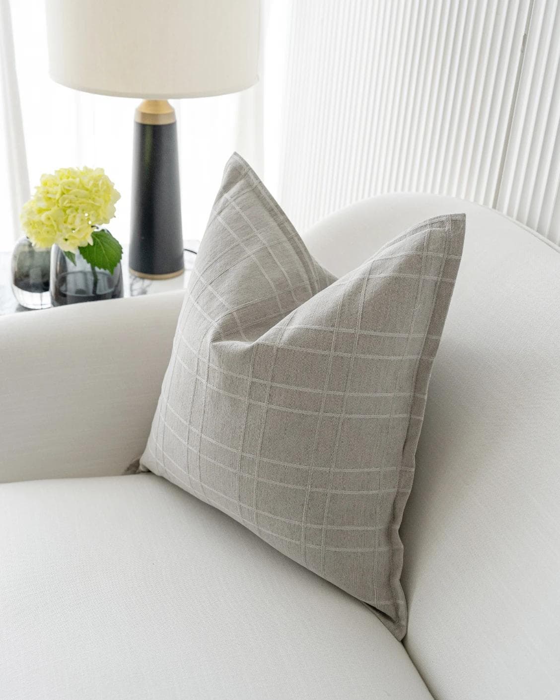 Lenora Laurent cushion in grey, shown in a lifestyle right view as image 5