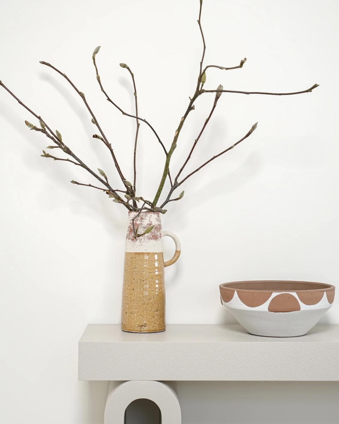 Leva Terra vases in white and beige, shown in a lifestyle front view as image 5